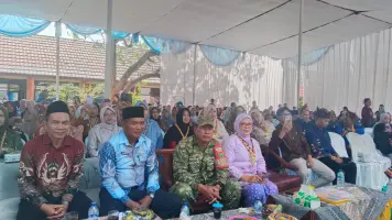 Babinsa Koramil 421-07/ SDM Serka Saryono Hadiri Perpisahan SMP Negeri 1 Sidomulyo